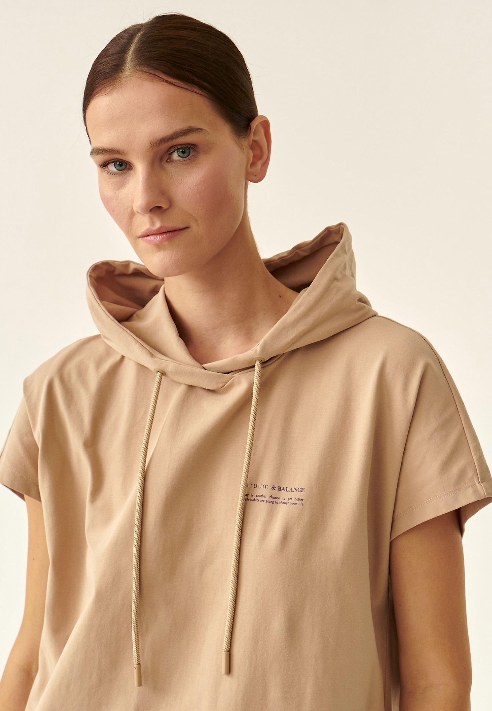 ŽENSKA BLUZA S KAPUCO AKSONA ŽENSKA BLUZA S KAPUCO AKSONA BEŽ 85970
