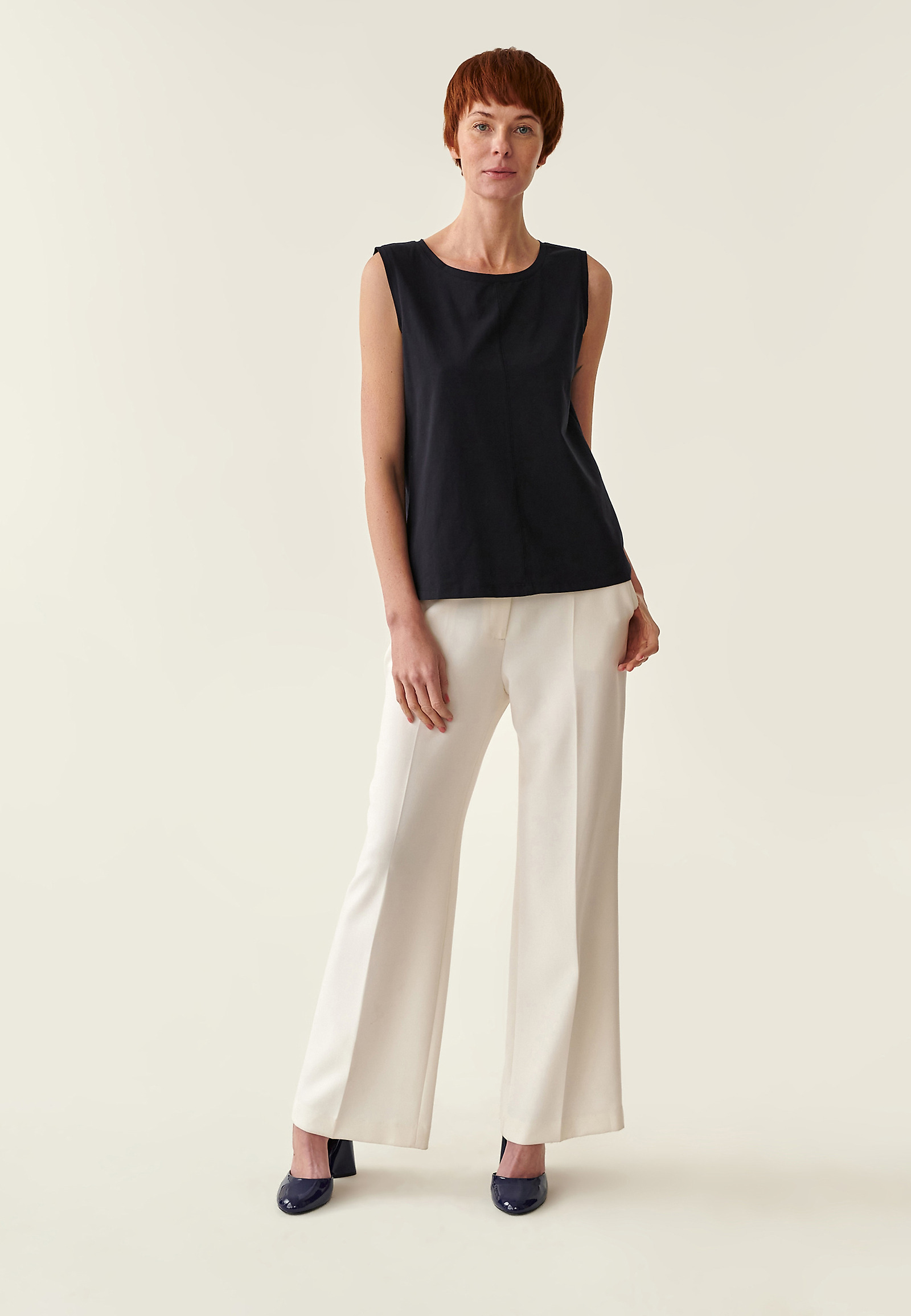 ŽENSKA BLUZA BREZ ROKAVOV FASATI ŽENSKA BLUZA BREZ ROKAVOV FASATI TEMNO MODRA 79840