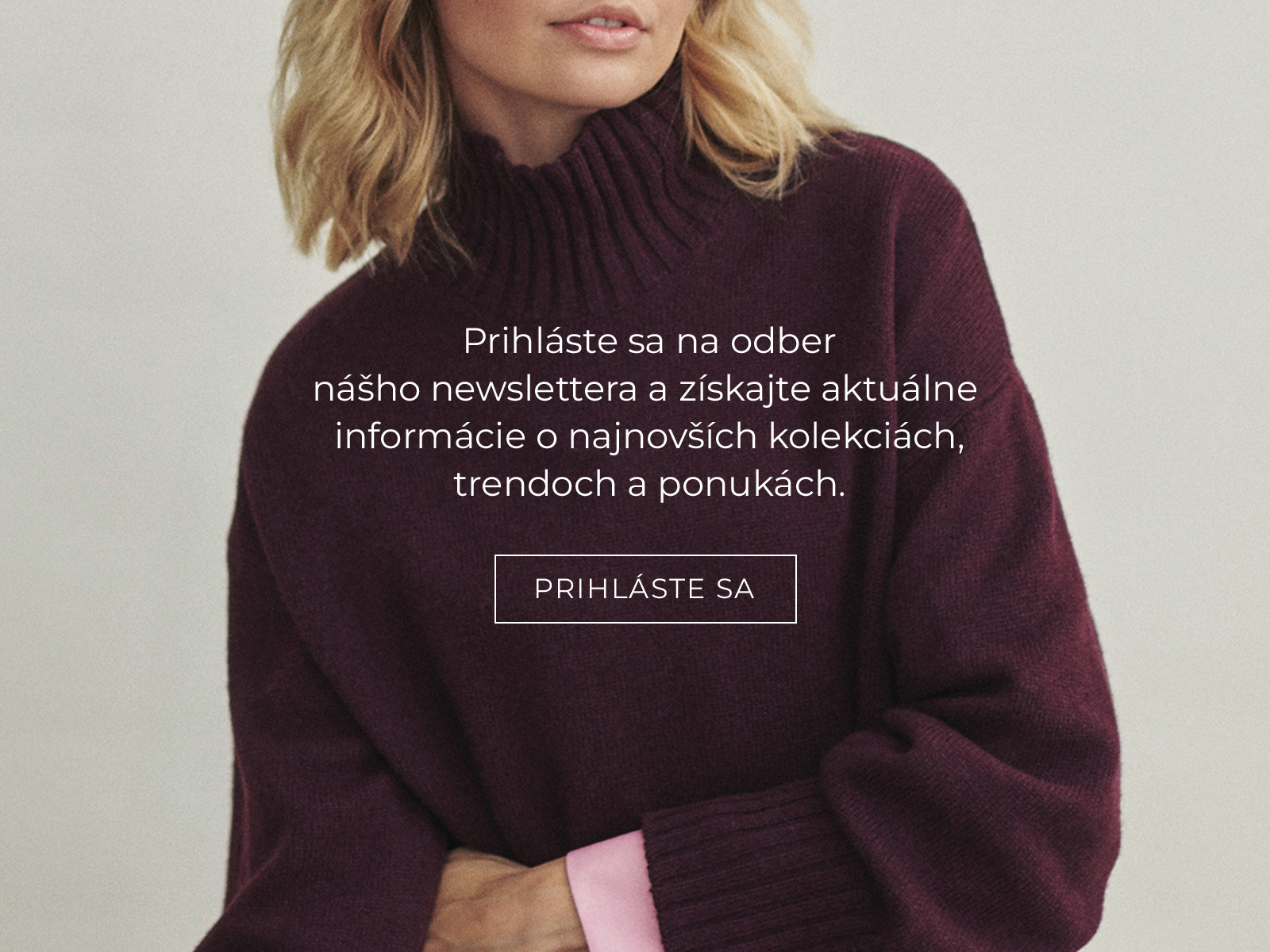 detailný záber na bordový vlnený sveter a prihlášku na odber noviniek