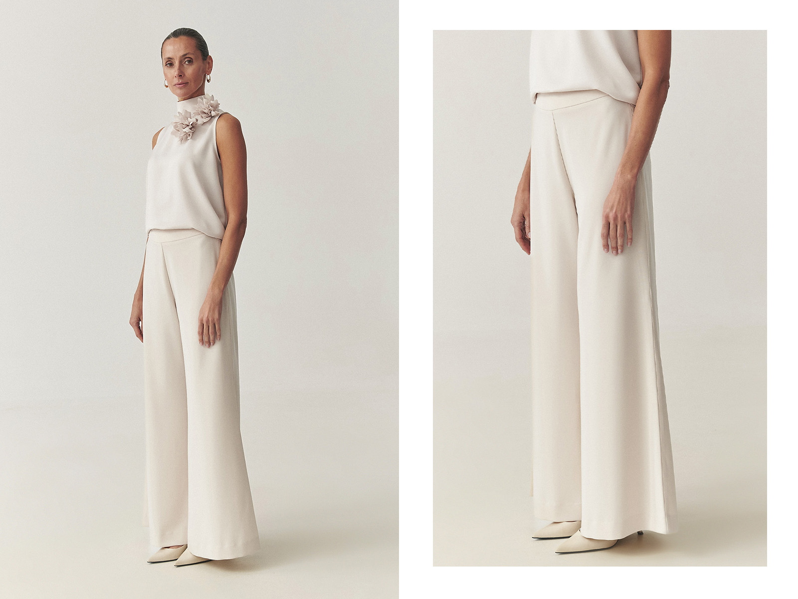 o femeie îmbrăcată într-o bluză elegantă cu o floare decorativă și pantaloni de costum