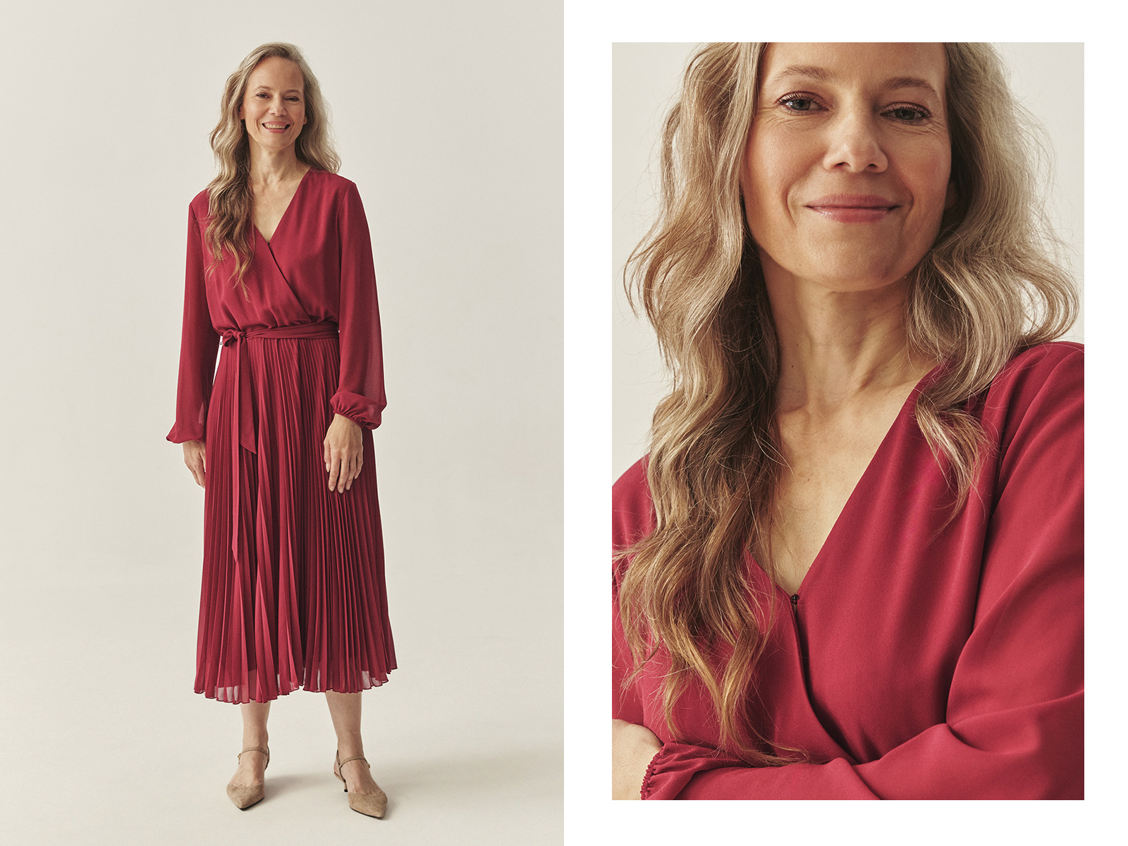 O femeie zâmbitoare stă în picioare, îmbrăcată într-o rochie.